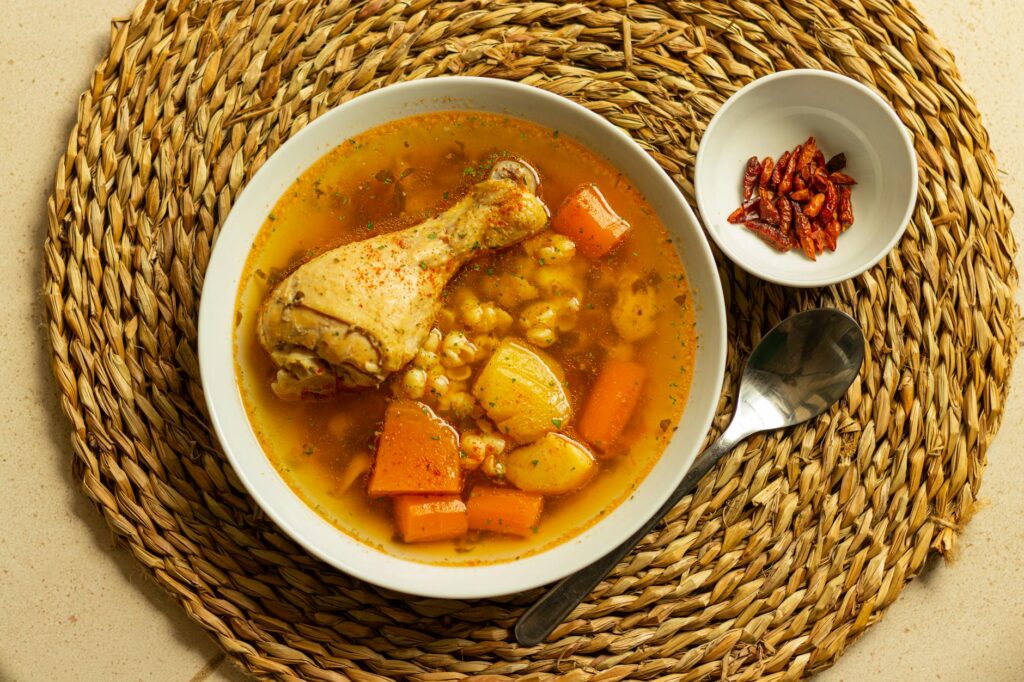 Moroccan chicken and sweet potato stew in a clay pot