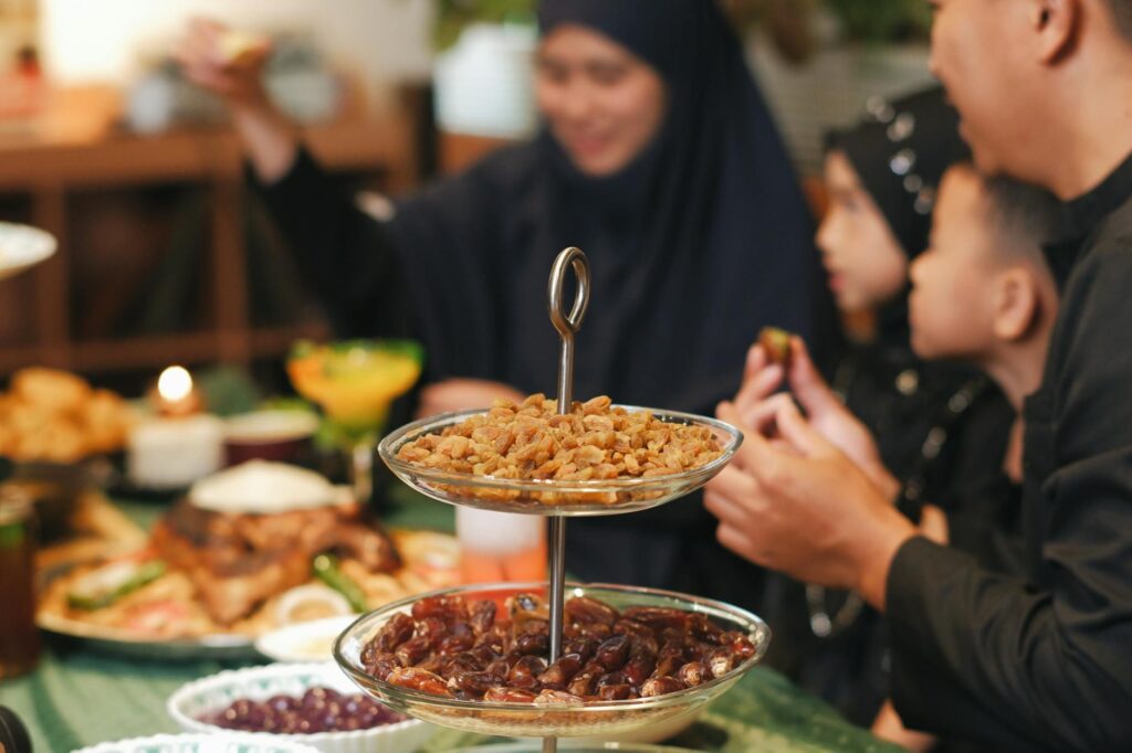 Family enjoying a variety of delicious iftar dishes during Ramadan 2026