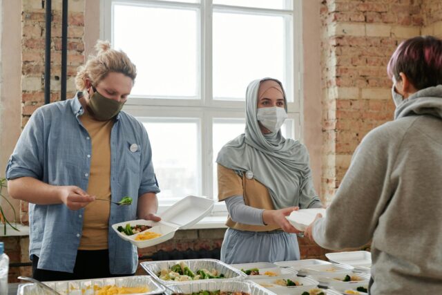 Family enjoying a festive Aid el-Fitr meal with traditional Maghrebi dishes