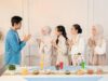 La fête musulmane chinoise : entre tradition et modernité Chinese family celebrating Muslim festival with traditional foods and decorations
