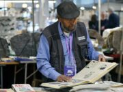 Pierre Vermeren : L’Algérie, une nation marquée par la guerre civile et son impact sur la société française Pierre Vermeren étudiant un livre sur la guerre d'Algérie