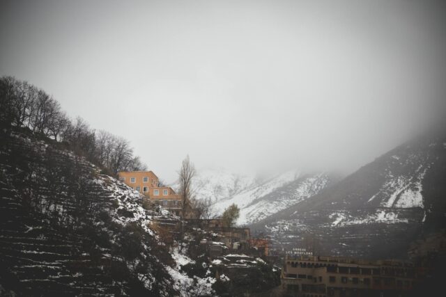 Berber family cooking tagine in Atlas Mountains, Morocco
