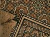 Valorisation des collections publiques de tapis marocains sous le protectorat français : quelles implications pour notre patrimoine culturel? Tapis marocain exposé dans un musée sous le protectorat français