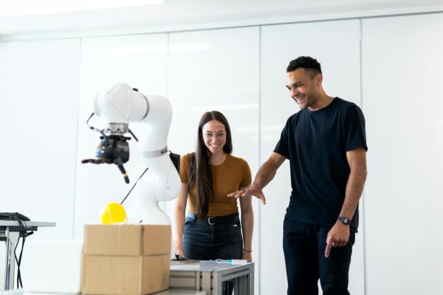 Talented Tunisian AI experts collaborating on a project at a high-tech lab