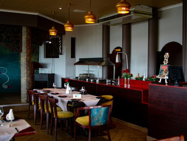 Interior of L'Échappée Belle restaurant in Saint-Jean-du-Falga showcasing a fusion of French and Maghreb cuisine