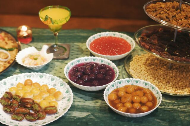 Family enjoying traditional Maghrebi dishes during the Iftar meal on Ramadan 2026