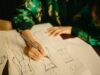 Reda Faklani: le designer belge qui fusionne héritage marocain et mode masculine Reda Faklani, a Belgian-Moroccan designer working at his studio filled with traditional Moroccan elements and contemporary me