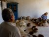 Creative Tunisia : 6 ans de reconstruction de l’artisanat tunisien Tunisian artisans working on handcrafted goods in a studio with natural light