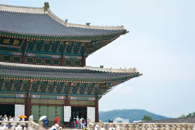 Paris and South Korea summer destinations Paris and Seoul skyline at sunset, couples exploring cultural attractions