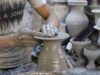 L’artisanat tunisien salué par l’UNESCO : découvrez les créations Tunisian pottery artisan at work, showcasing intricate patterns and vibrant colors
