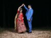 Un mariage presque traditionnel au Hellfest : un événement exceptionnel pour la communauté maghrébine de la diaspora Mariage presque traditionnel au Hellfest, couple maghrebin dansant sur scène avec la foule
