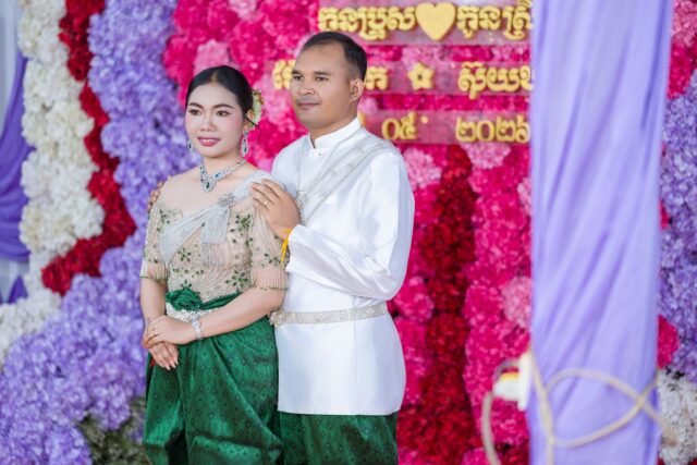 traditional khmer wedding ceremony with bride and groom in traditional attire