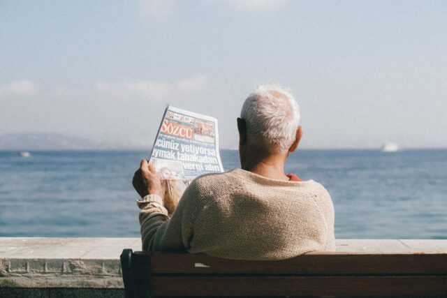 French retirees enjoying idyllic life in Tunisia, sunny streets and palm trees