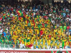 Le Maroc au cœur de la Coupe d’Afrique des Nations 2026 : une victoire à célébrer Maroc hébergeur de la Coupe d'Afrique des Nations 2026, joueur marocain célébrant une victoire