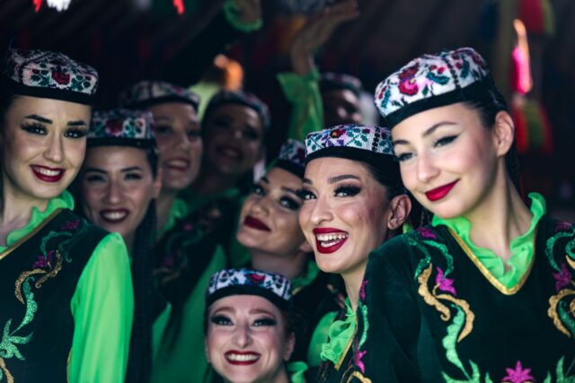 Kabyle women embroidery Women in traditional Kabyle clothing embroidering fabric