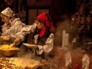 Célébrer la culture berbère à Sainte-Anne-d’Auray : les Galettes du Monde Berber women serving traditional dishes at the Galettes du Monde festival in Sainte-Anne-d'Auray, France