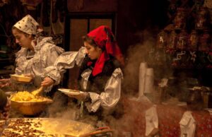 Célébrer la culture berbère à Sainte-Anne-d’Auray : les Galettes du Monde Berber women serving traditional dishes at the Galettes du Monde festival in Sainte-Anne-d'Auray, France