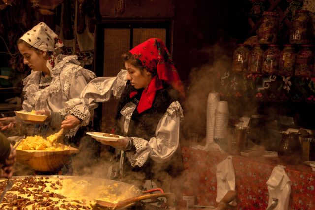 Berber culture at Galettes du Monde Berber women serving traditional dishes at the Galettes du Monde festival in Sainte-Anne-d'Auray, France