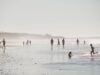 Top destinations all-inclusive au Maroc pour un séjour sous 400 € Family enjoying all-inclusive vacation at crystal clear waters beach in Agadir, Morocco