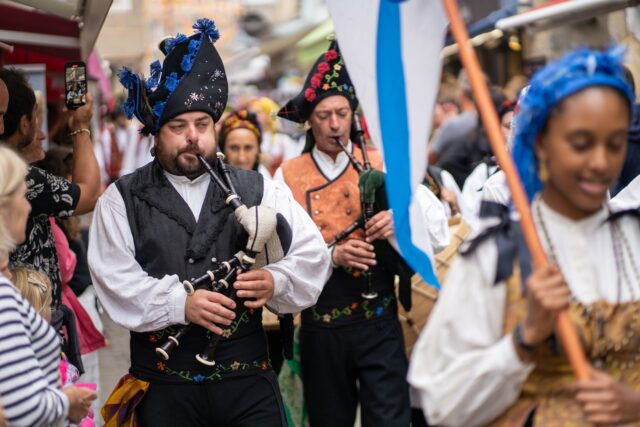 Cross-Channel couple Elodie and Pierre-Yves wearing traditional Breton costumes during their wedding in Lorient, France