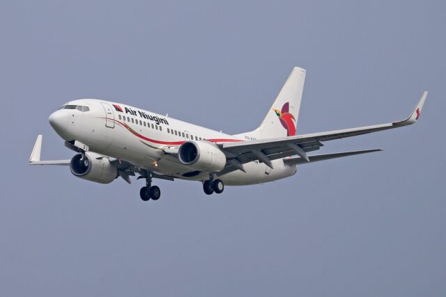 Air Algérie plane with Moroccan flag on tail, offering 30% discount to expatriates