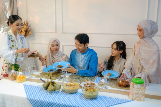 family enjoying traditional Ramadan recipes during the fourth week