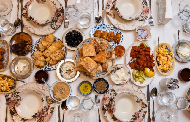 Family preparing Ramadan 2026 dishes with Algerian, Tunisian, and Moroccan cuisine