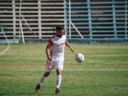 La Tunisie dans la Coupe du monde : présentation de ses maillots Tunisienne en tenue de foot en train de marquer un but pendant la Coupe du monde 2022