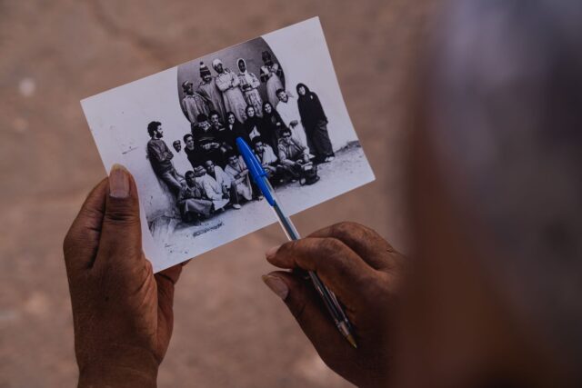 Woman holding a copy of the Moudawana in Morocco