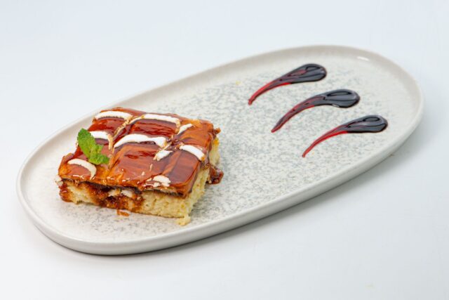 Trileçe dessert - layered pastry filled with nut or chocolate cream, served on a festive table