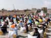 La Fête Musulmane de l’Aïd el-Kébir : Un Regard Sur Sa Signification et Ses Rites Famille traditionnelle réunie pour la fête musulmane de l'Aïd el-Kébir en robe et turban