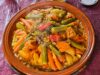 Les recettes traditionnelles algériennes à tenter lors du Ftour Famille autour d'un couscous traditionnel algérien pendant le Ftour