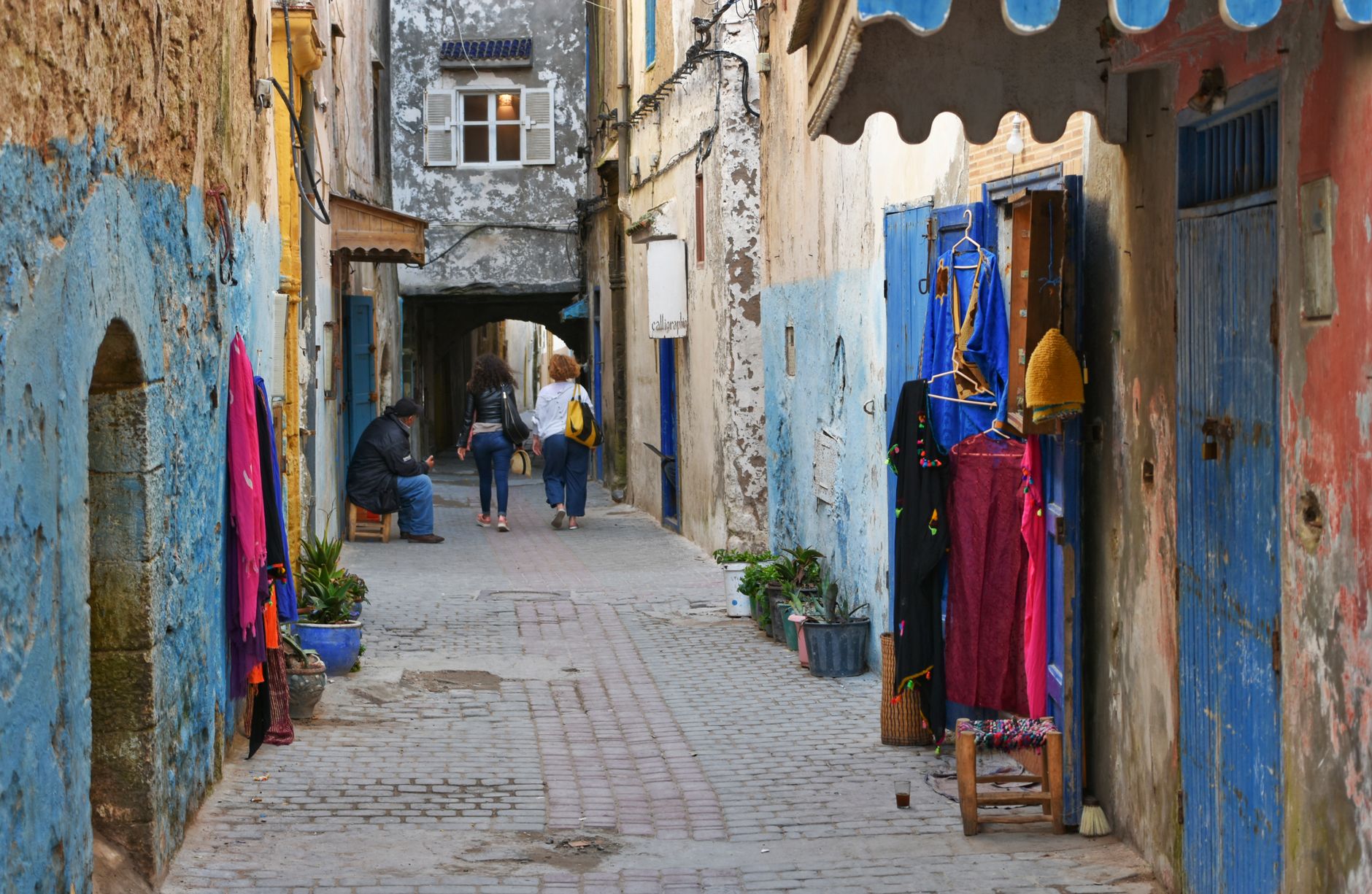 Laval street scene with Moroccan influences, featuring music, food, and art