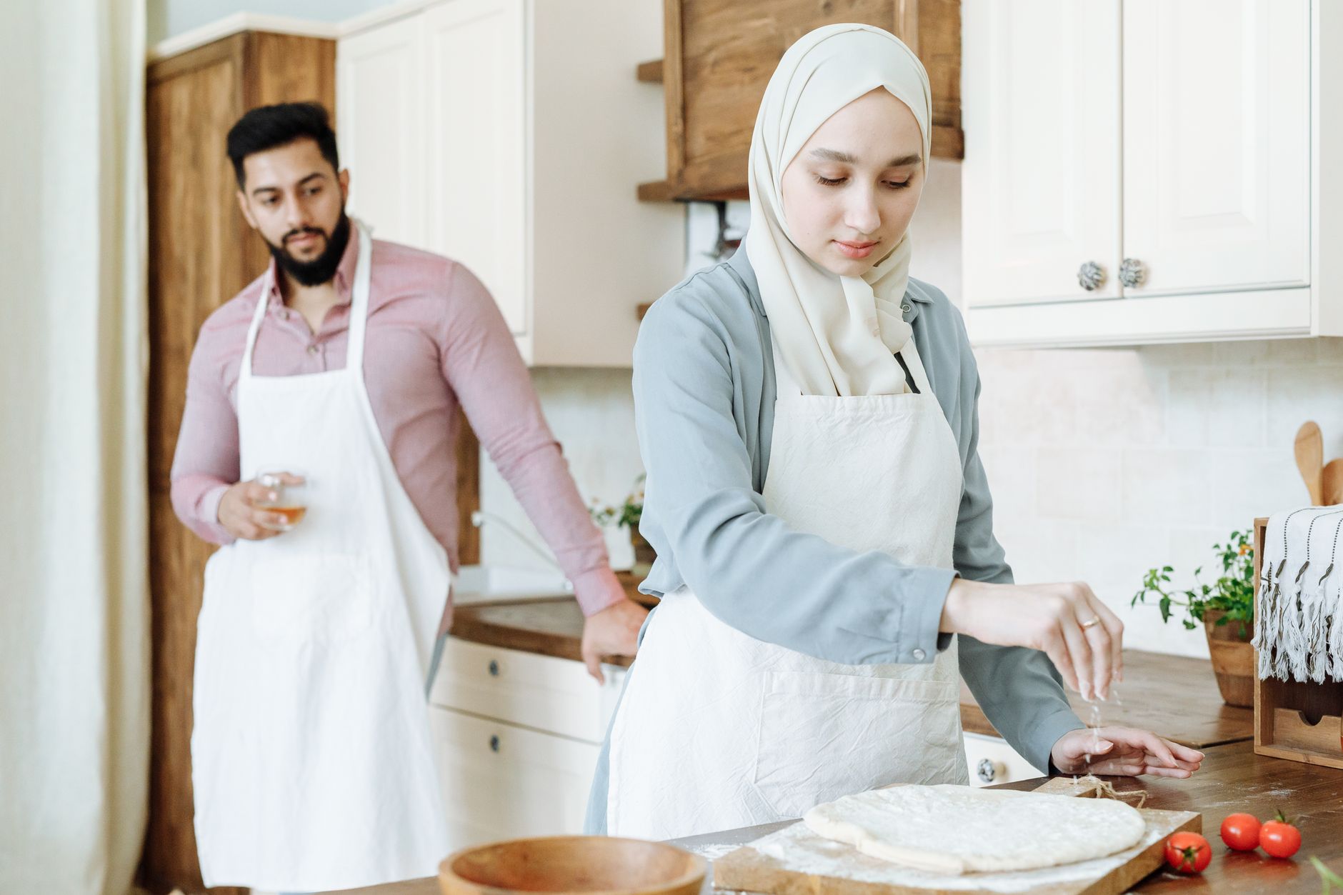 Family preparing and freezing traditional Moroccan, Algerian, and Tunisian Ramadan dishes