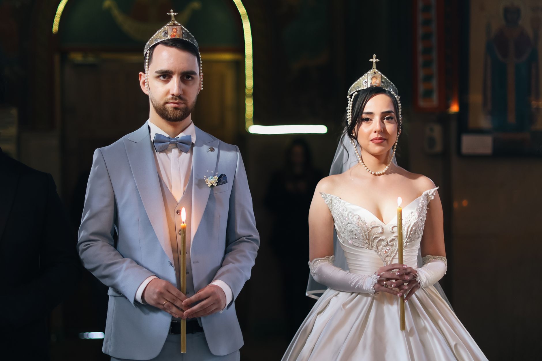 Ozbek couple at a traditional wedding ceremony surrounded by family and friends