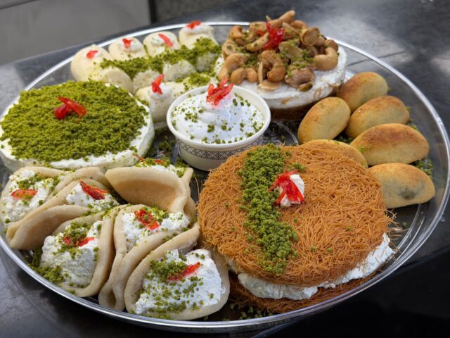 traditional and modern Ramadan desserts on a colorful serving platter