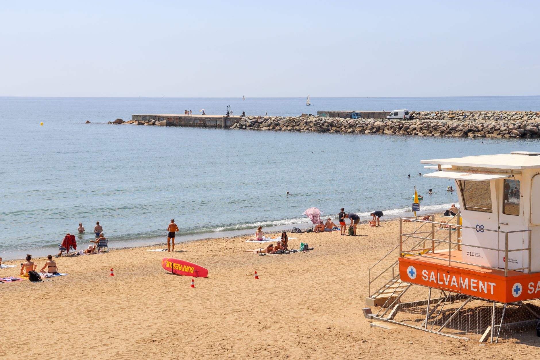 Family enjoying the sunny beach in Costa del Sol, Spain